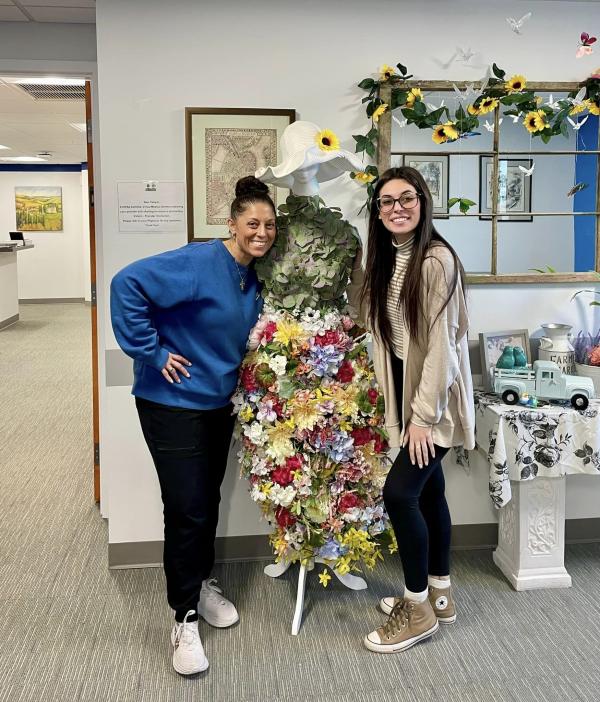 Staff w/ flower lady