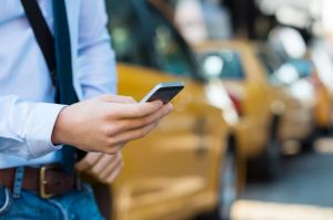 A man measures noise levels with his phone.